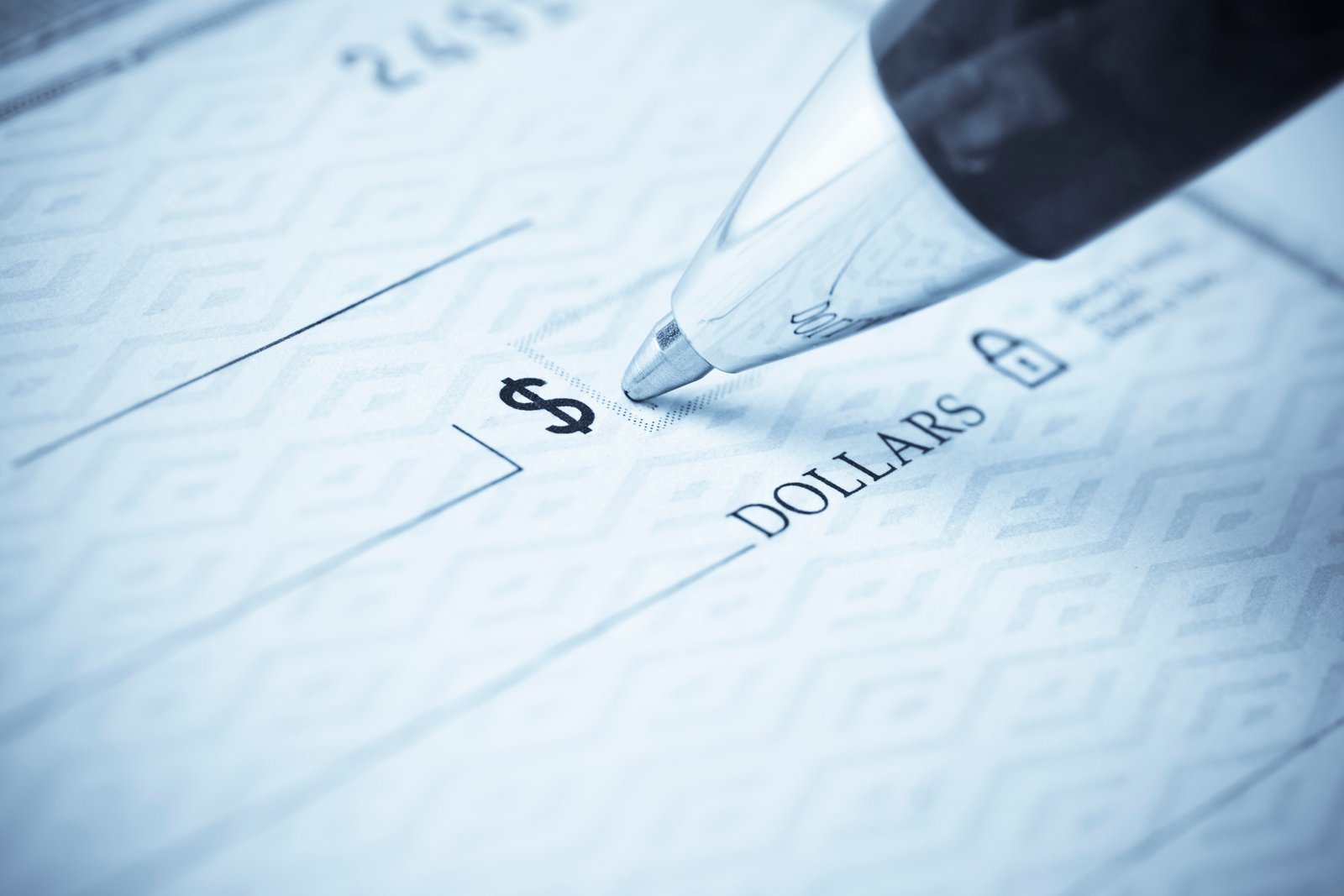 Writing a check.  Please visit my lightbox for more similar photos